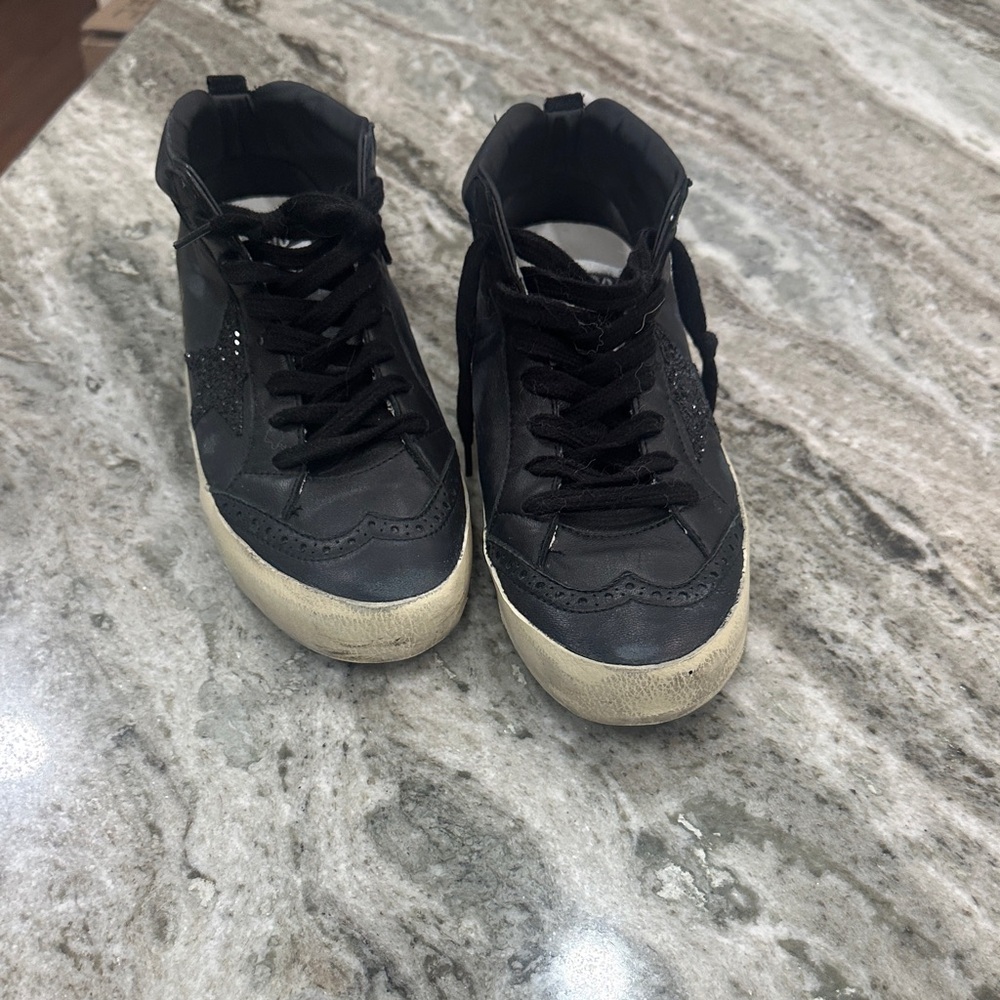 Golden Goose Midstar Black and White Sneakers